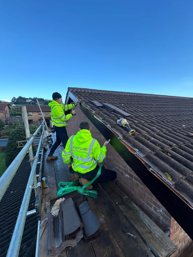 Roof Cure 24/7 team on-site fitting fascias & soffits